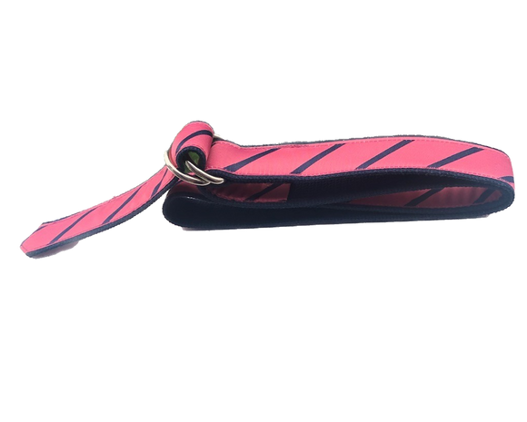 A LLillie Exclusive, popular Nantucket red with diagonal navy Stripe that is repeated across the belt.The belt is finished on navy webbing with stainless D-Rings.