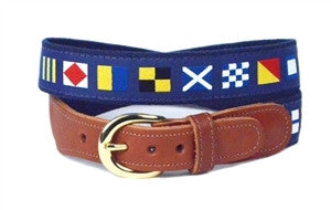 Men's colorful, nautical code flag ribbon belt is stitched to navy webbing with leather tabs and a brass buckle. Size: 30-44.