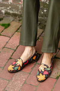 Multi fall colors in a fall pattern of Fall favorites on chocolate brown background. Perfect transion shoe as the temps change
