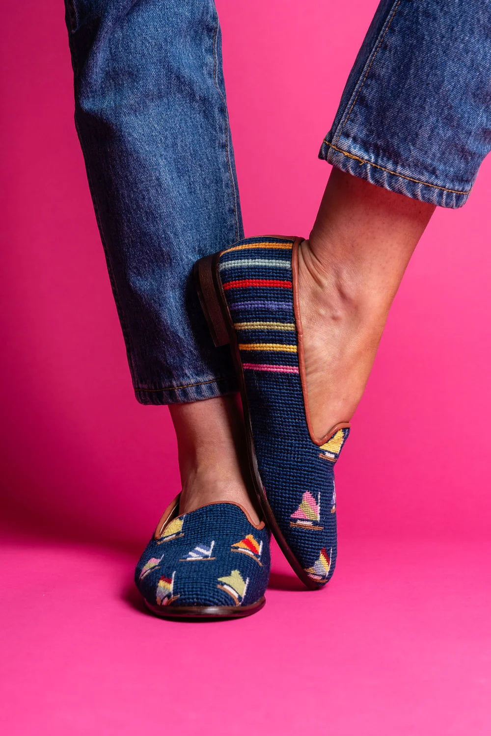 Navy needlepoint shoes withe the muti colored nantucket sail embroidered on the shoe So Popular