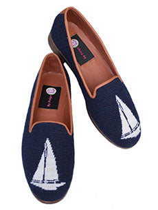 This is a casual chic addition to our handstitched needlepoint loafer collection. It's simple design has a pure white sail boat design that brings back fond memories of your favorite trips cruising along the coast