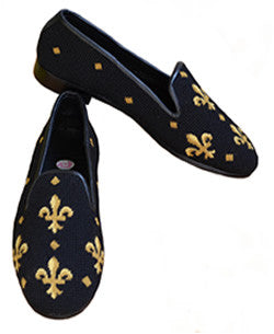  The classic Black Fleur de Lis needlepoint loafer is a wardrobe staple. It is leather trimmed and lined and has a high quality fit It is finished with a composite sole  and a 1/2 inch heal. Shop now with Lillie