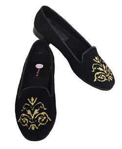 The most elegant gold metallic scroll on a black hand stitched needlepoint loafer is designed to flatter your good taste. It is finished with a composite sole and half inch heel. Shop with lillie.
