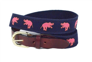 Men's pink elephant ribbon belt on navy ribbon is a Lillie Design exclusive finished with leather tabs and a brass buckle.