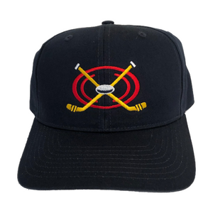 Kid's navy baseball cap features a cool image of crossed hhockey sticks on red circles with a gray and black puck in the cross of the sticks.