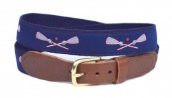 Preppy  lacrosse belt for boys in Red white and Navy, is a Designs by Lillie Exclusive. The belt is constructed on navy webbing with a brass buckle and leather tabs