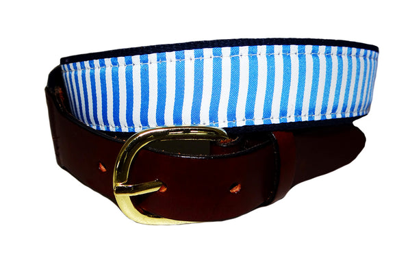 Men's Classic ribbon belt has  light blue and white stripe i9s stitched on to navy wbbing and tied together with leather tabs and a brass buckle.                                               e ribbon be                        l     r                                                                                                                                                     