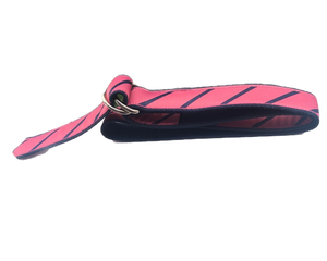 Lillie's exclusive Nantucket red ribbon belt has complimentary navy diagonal stripes. It is finished on navy cotton webbing with D-rings. Size: XXS-large